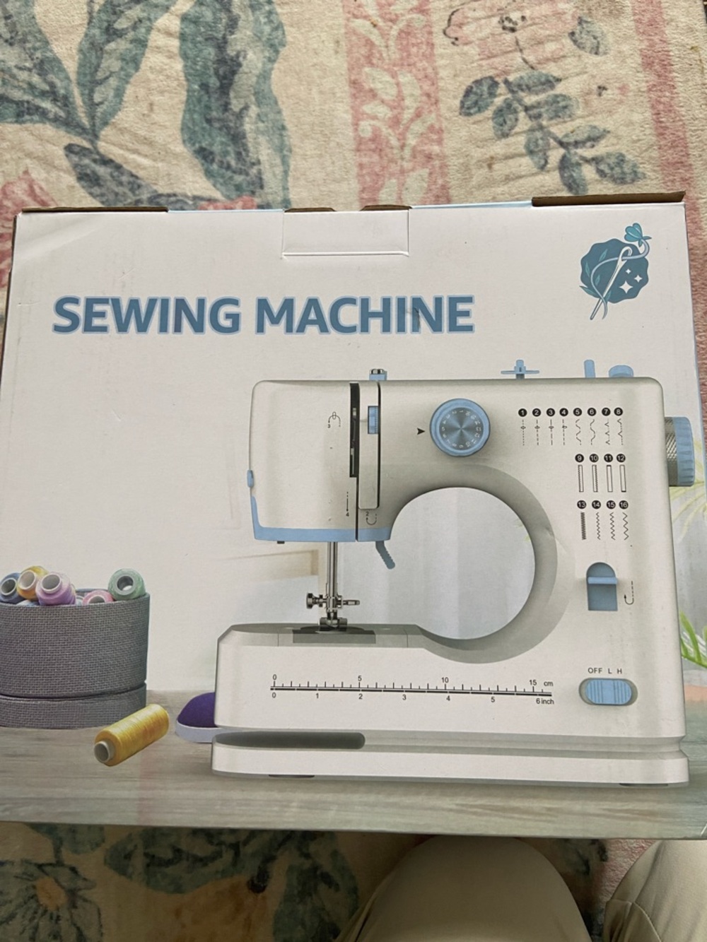 Compact White and Light Blue Sewing Machine -